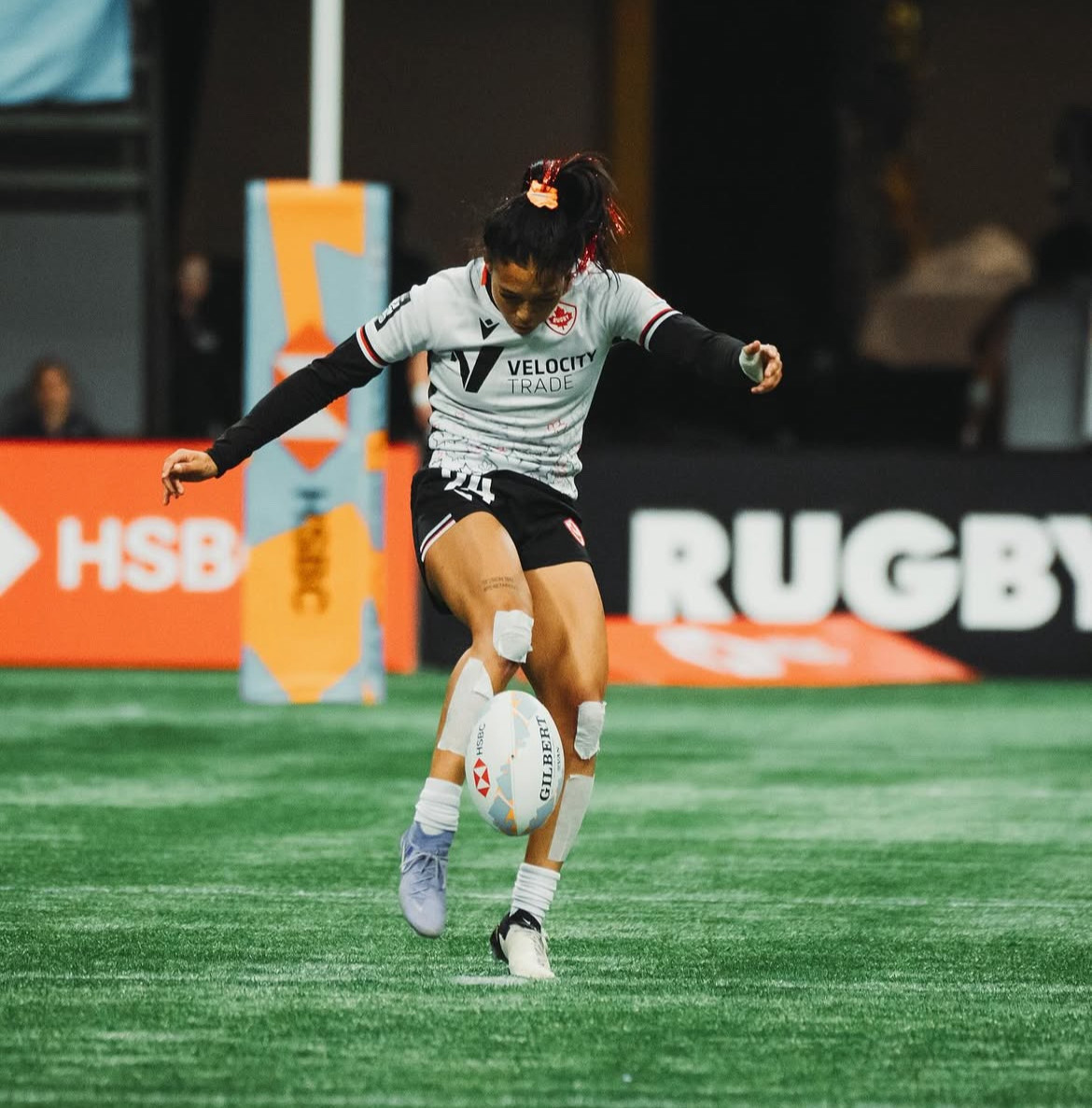 Asia kicking ball